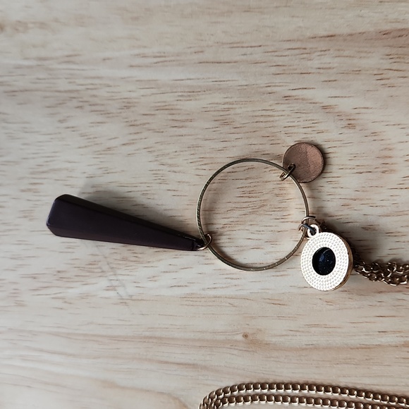 Necklace with a black charm and a purple cone-shaped rubber charm - Picture 3 of 4